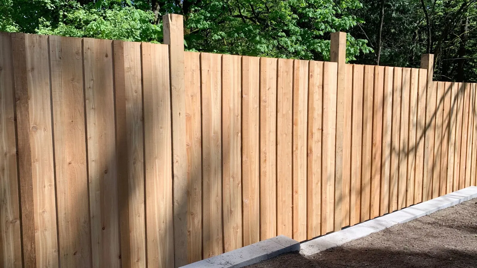 Wood board fencing installation