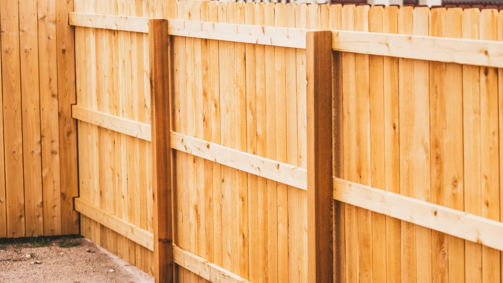 Wood privacy fence installation