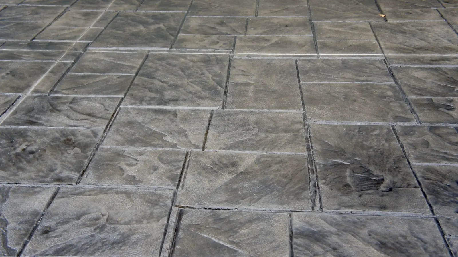Textured stamped concrete patio completed by B&R Services near Louisville, Kentucky